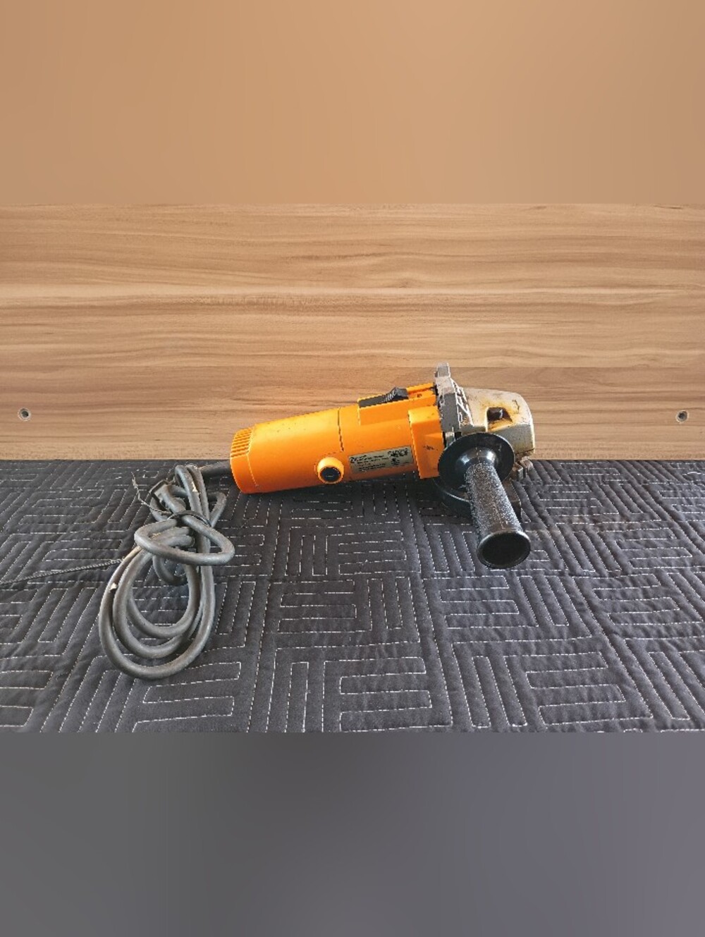 Electric Angle Grinder in Orange and Black